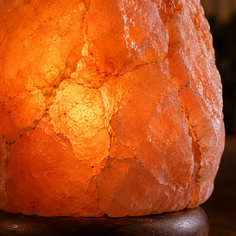 Close-up of glowing pink Himalayan salt crystal texture and natural mineral variation