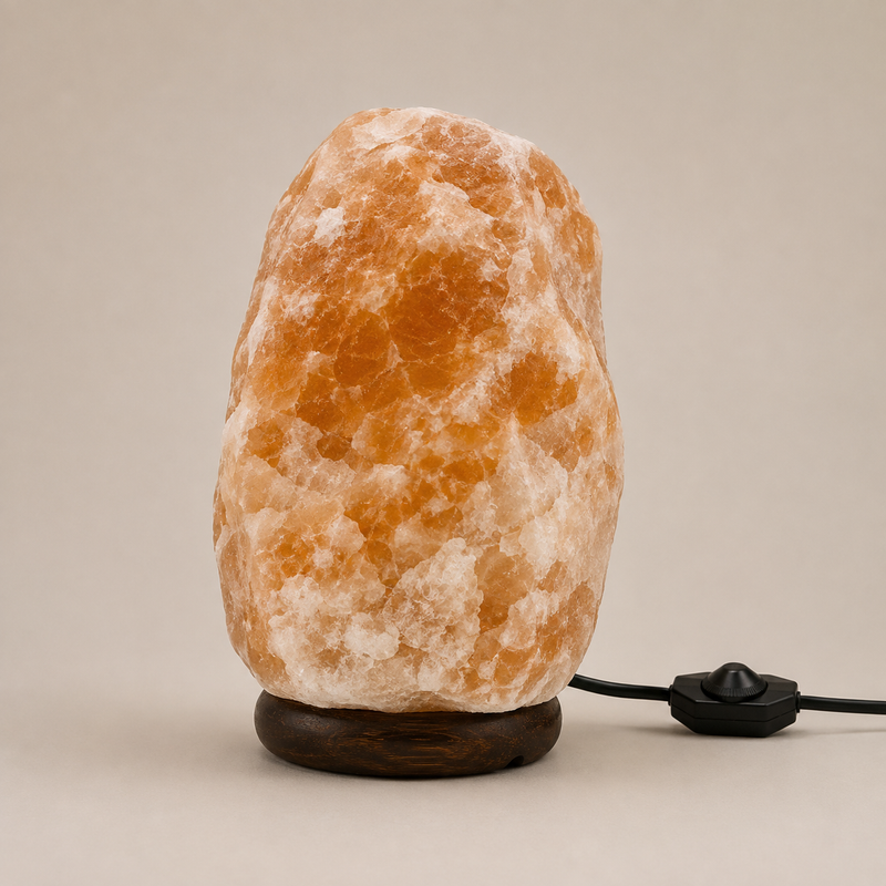 Natural Himalayan pink salt lamp on a wooden base